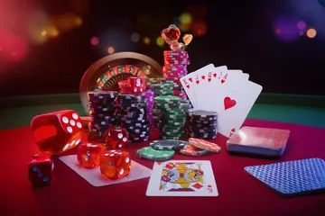 A player using their smartphone during a festive local event, representing JLMMM’s fully mobile-friendly casino.