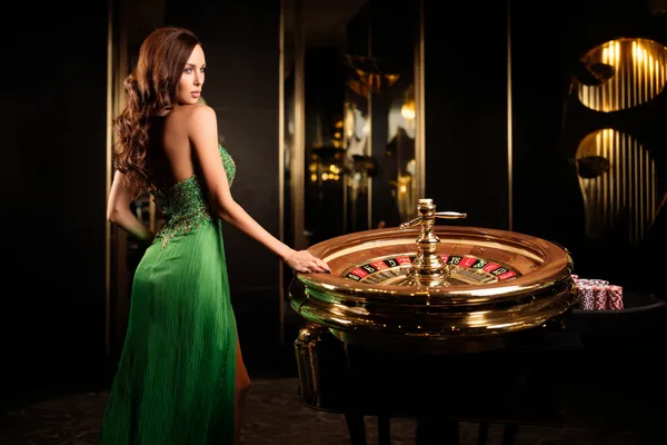 A person using their device against a moody casino-themed background, illustrating the smooth re-entry process at JLMMM.